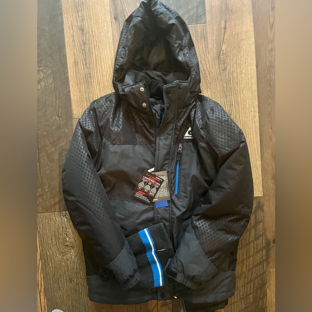 Gerry 3 in 1 youth jacket with tags.